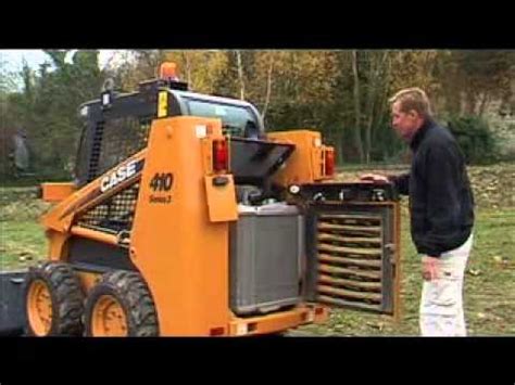 case 420 skid steer battery location|case 420 battery.